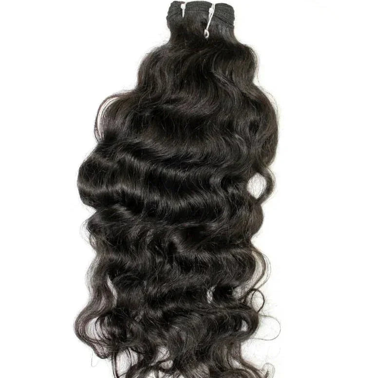 Raw Vietnamese wavy hair bundle with natural shine and soft, defined curls